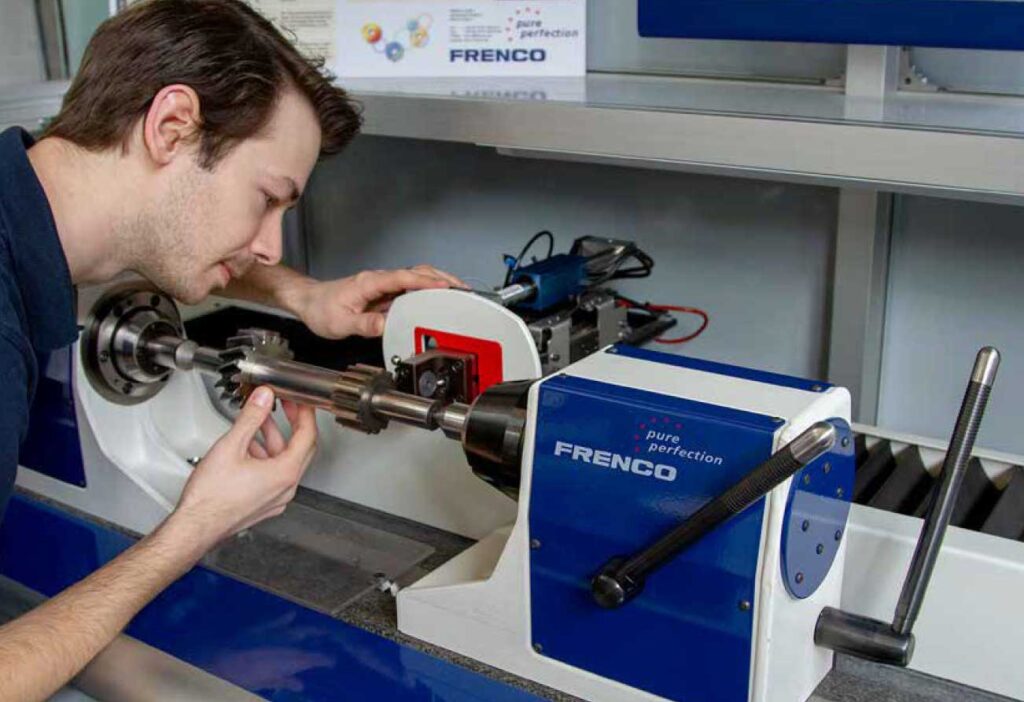 A Frenco tech works on
the final assembly of a
cluster shaft checker.